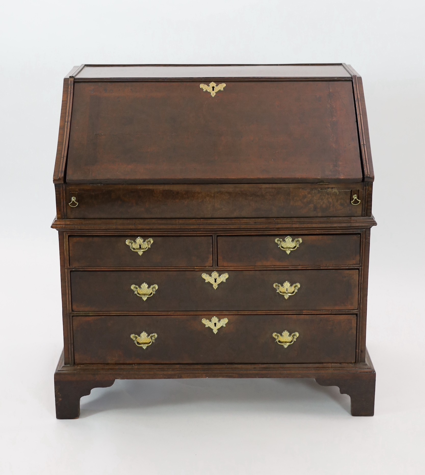 An early 18th century burr walnut bureau, W.105cm D.61cm H.108cm